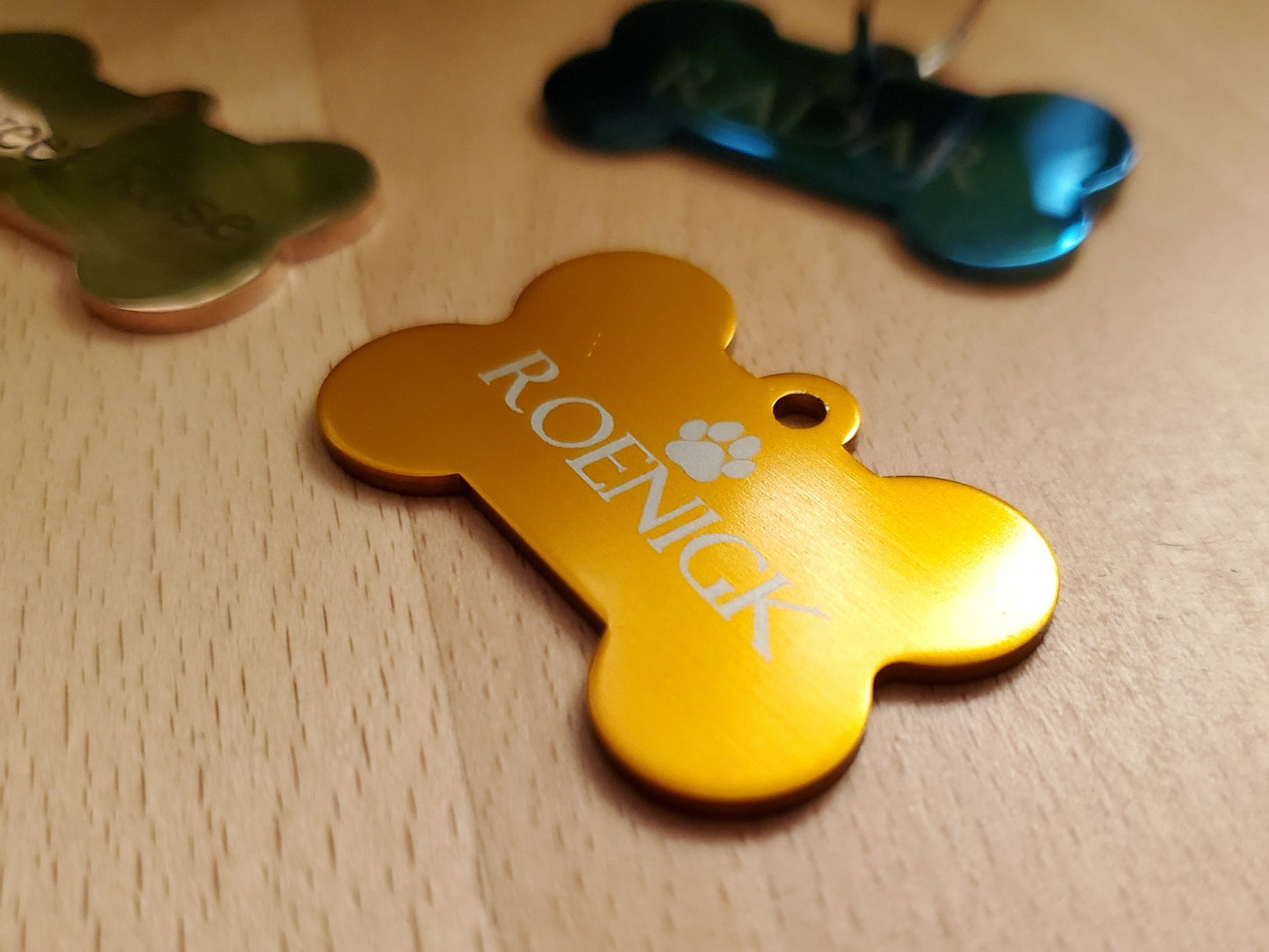 laser engraved aluminum dog bone tag for pets in gold